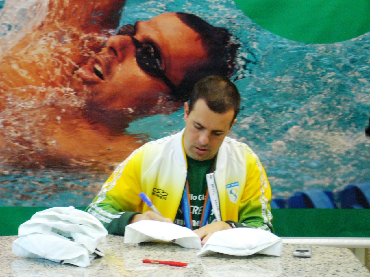 Altografando bonés e camisetas na Unimed Americana após o Pan do Rio 2007.